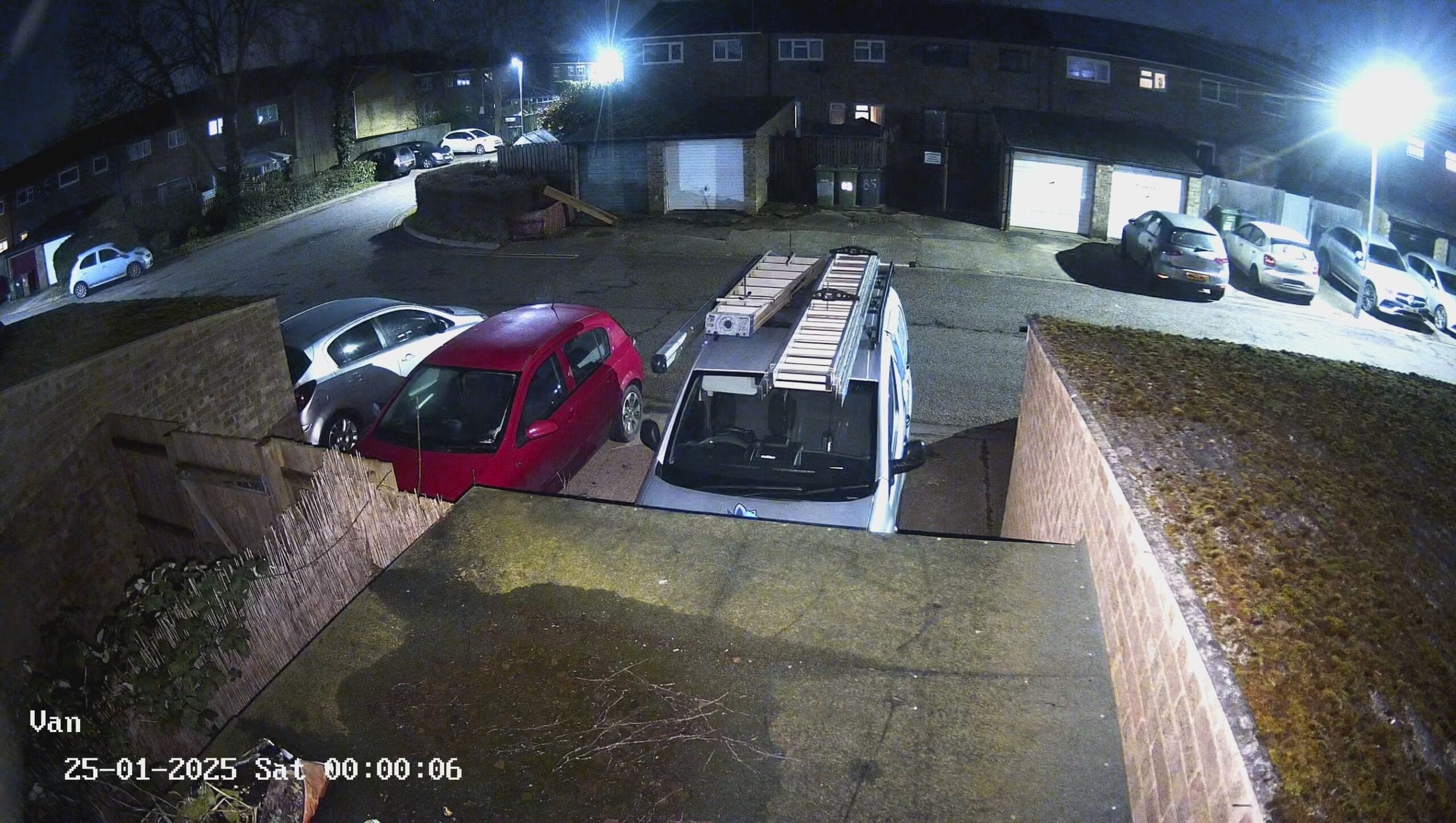 Duke Security CCTV Camera looking towards a van with full colour at night.