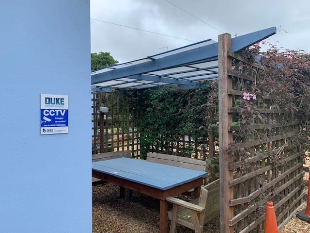 Duke Security Systems CCTV signage on pub premises in Peterborough — legally compliant data protection notice