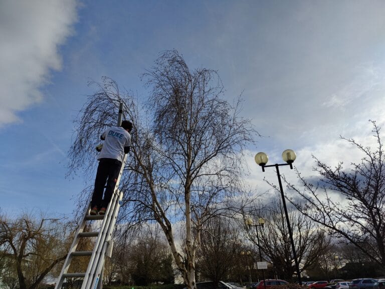 CCTV camera installation on lamppost by Duke Security Systems engineer in Peterborough